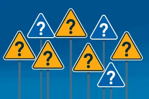 Ilustração digital minimalista em fundo azul degradê com sete placas triangulares de atenção, em azul e amarelo, cada uma exibindo um ponto de interrogação central, representando os 7 perfis da Link Rastreio.